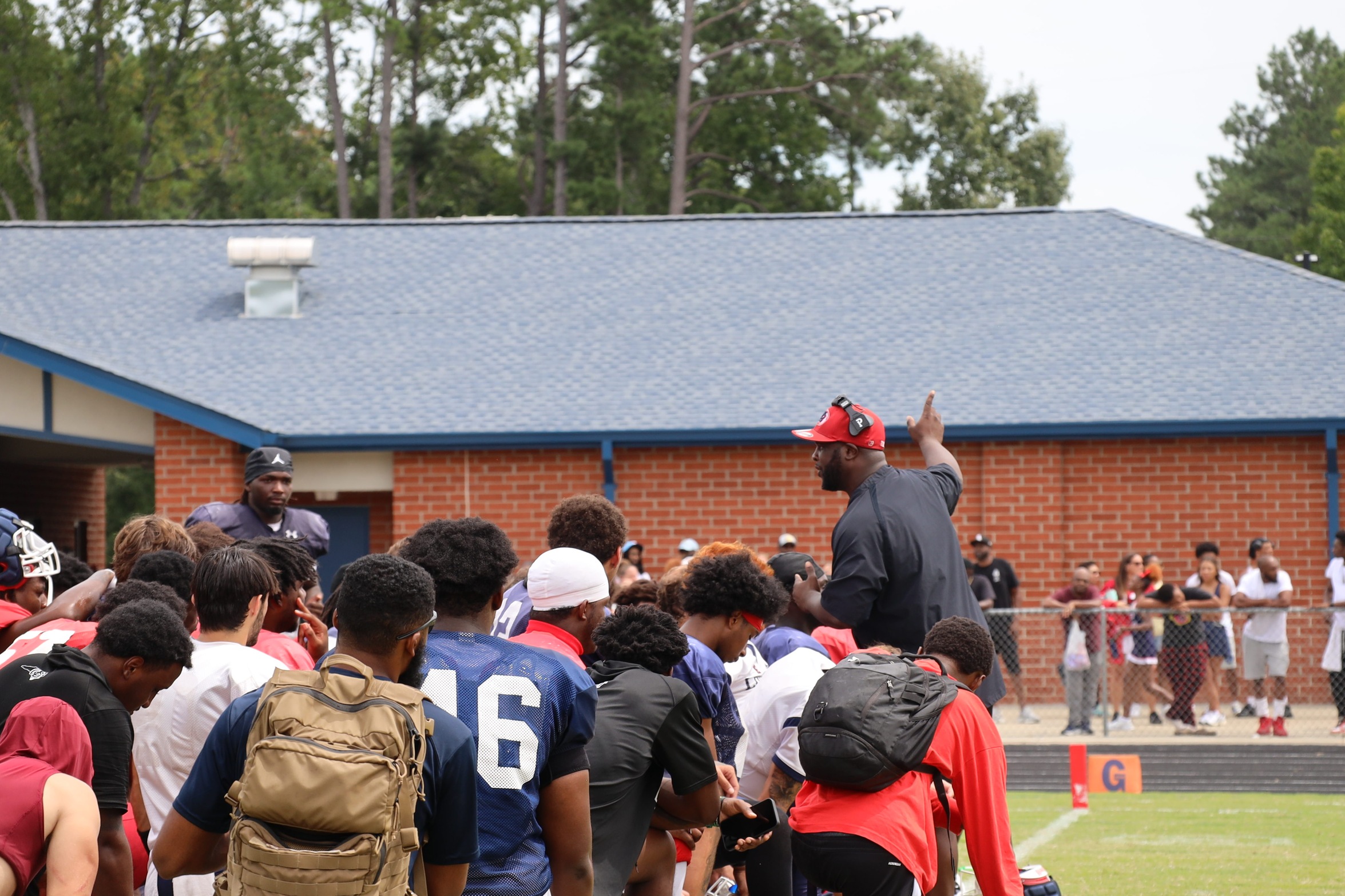 Coach Spellman addressing his team