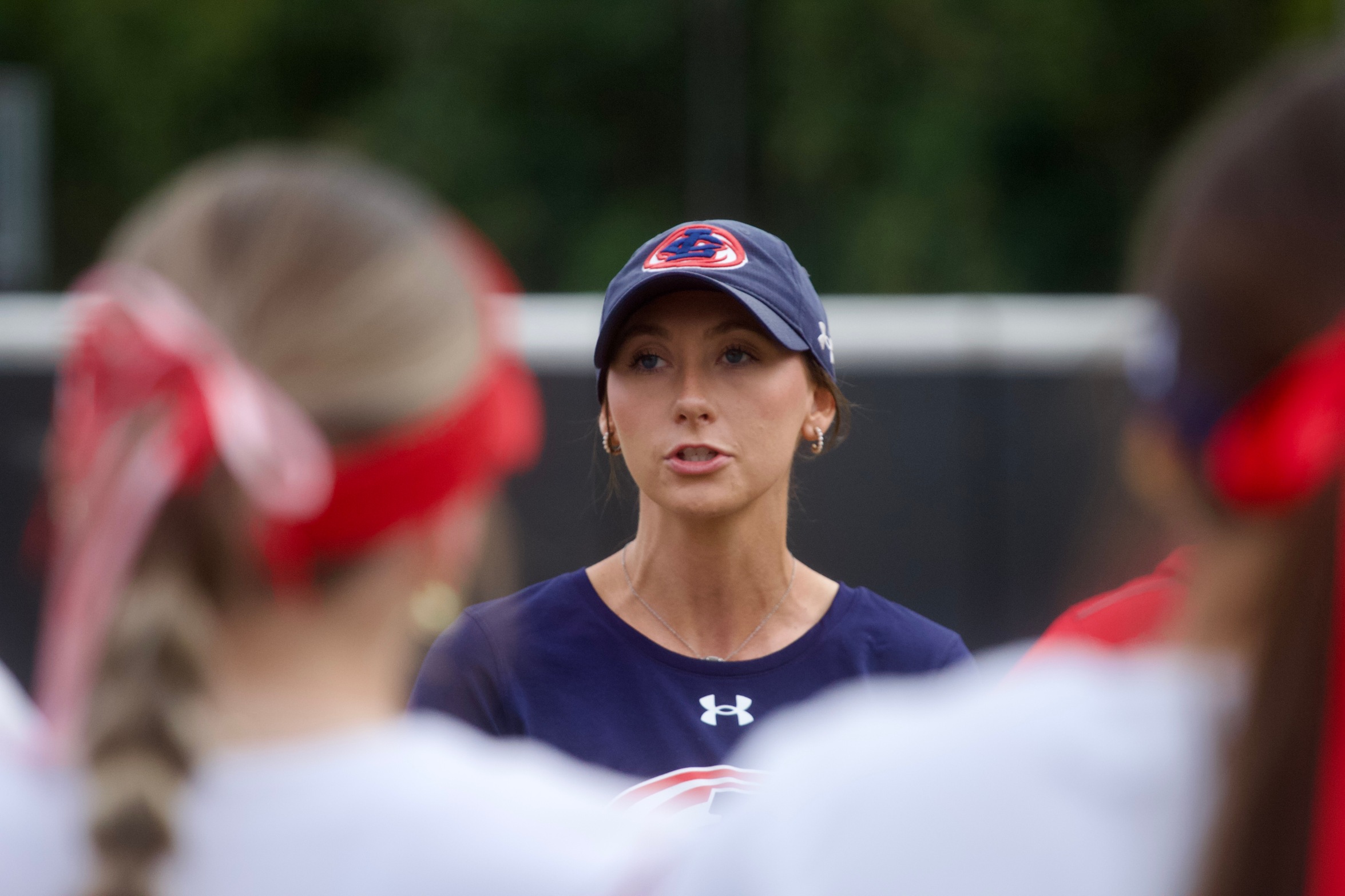 Coach Garad talks to her team